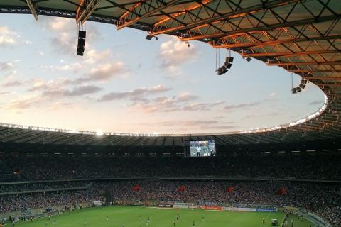 Football stadium. The Bengali for "football stadium" is "এরিনা ফুটবল".