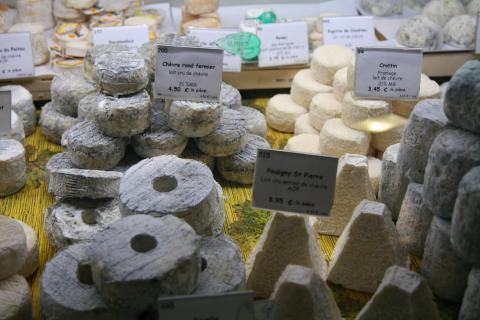 Cheeses. The French for "cheeses" is "fromages".
