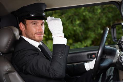 A driver. The French for "a driver" is "un chauffeur".