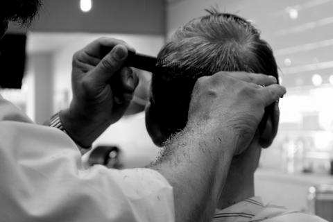 A hairdresser (masculine). The French for "a hairdresser (masculine)" is "un coiffeur".