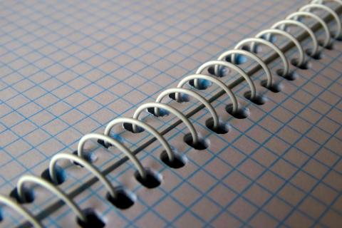 A spiral notebook. The French for "a spiral notebook" is "un cahier à spirales".