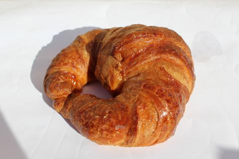 A croissant. The French for "a croissant" is "un croissant".