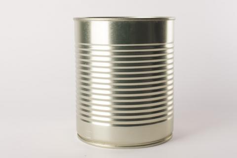 Tin can. The French for "tin can" is "boite".