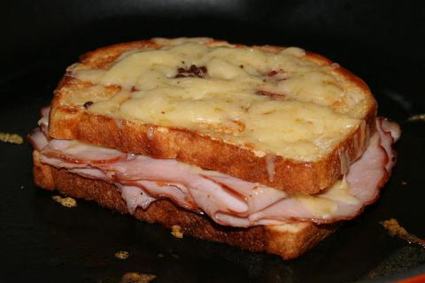 Toasted cheese and ham sandwich. The French for "toasted cheese and ham sandwich" is "croque-monsieur".