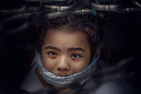 To abduct. The French for "to abduct" is "enlever".