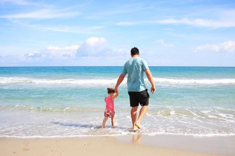 On the beach. The French for "on the beach" is "sur la plage".