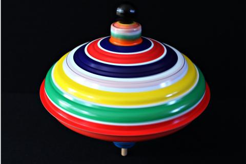 Spinning-tops. The French for "spinning-tops" is "toupies".