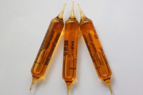 Ampoule. The German for "ampoule" is "Ampulle".