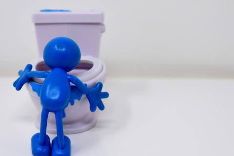 To puke. The German for "to puke" is "kotzen".