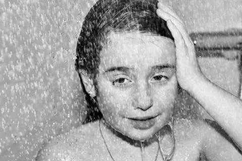 To take a shower. The German for "to take a shower" is "duschen".