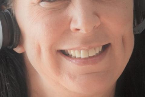 Dimples. The Greek for "dimples" is "λακκάκια".