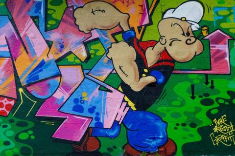 Cartoon. The Greek for "cartoon" is "κινούμενα σχέδια".