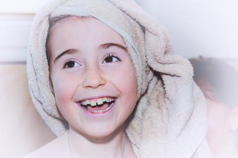 To laugh. The Italian for "to laugh" is "ridere".