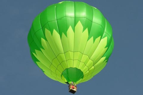 Hot-air balloon. The Thai for "hot-air balloon" is "บอลลูน".