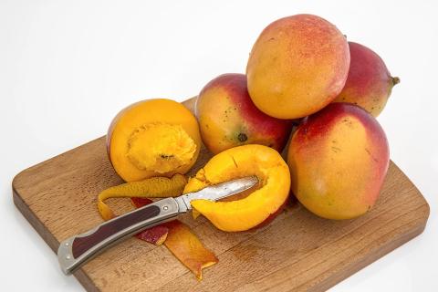 Mango. The Thai for "mango" is "มะม่วง".