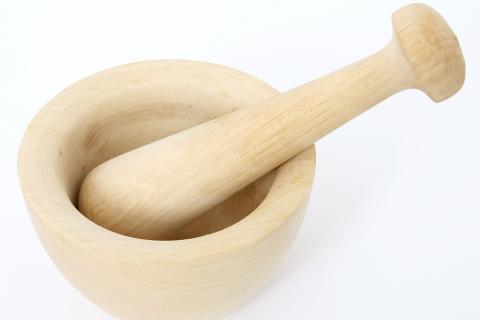 Mortar and pestle. The Thai for "mortar and pestle" is "ครกและสาก".