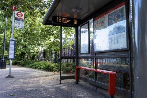 Bus stop. The Thai for "bus stop" is "ป้ายรถเมล์".