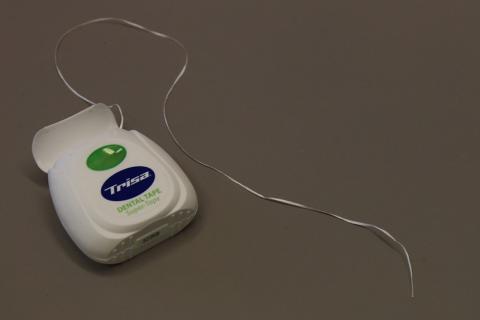 Dental floss. The Thai for "dental floss" is "ไหมขัดฟัน".