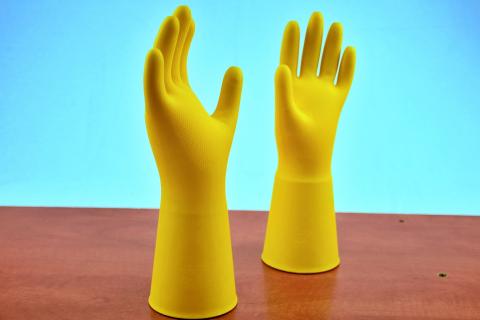 Rubber gloves. The Thai for "rubber gloves" is "ถุงมือยาง".