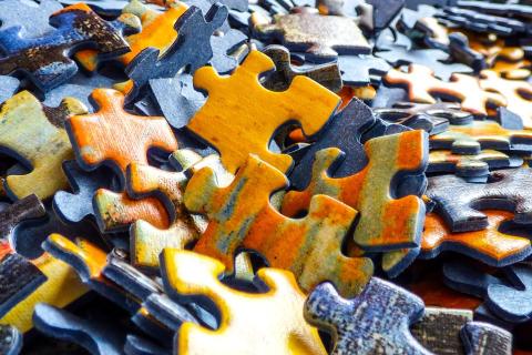 Jigsaw puzzle. The Thai for "jigsaw puzzle" is "จิ๊กซอว์".