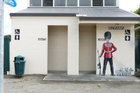 Public toilet. The Thai for "public toilet" is "ห้องน้ำสาธารณะ".