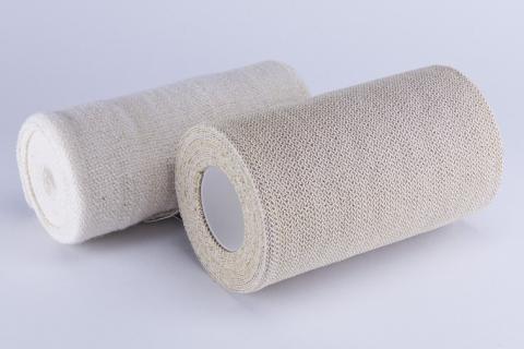 Two rolls of bandages. The Thai for "two rolls of bandages" is "ผ้าพันแผลสองม้วน".
