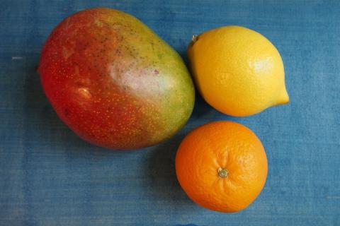 A mango, an orange and a lemon. The Thai for "a mango, an orange and a lemon" is "มะม่วง ส้ม และมะนาว".