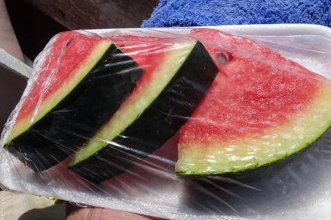 Three slices of watermelon. The Thai for "three slices of watermelon" is "แตงโมหั่นสามชิ้น".