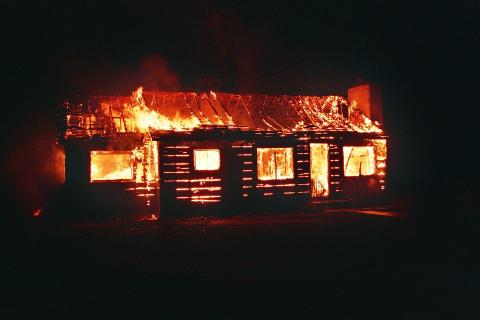A house on fire. The Thai for "a house on fire" is "ไฟไหม้บ้าน".