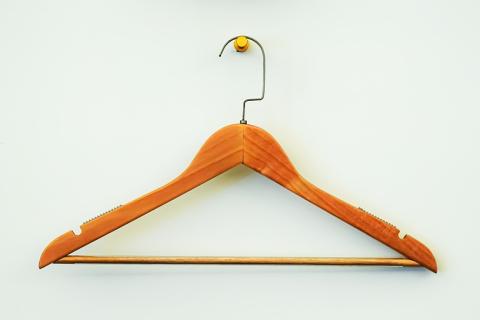 Clothes hanger. The Thai for "clothes hanger" is "ไม้แขวนเสื้อ".