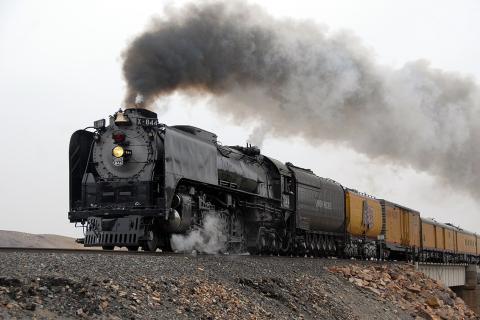 The smoke from a train. The Thai for "the smoke from a train" is "ควันจากรถไฟ".