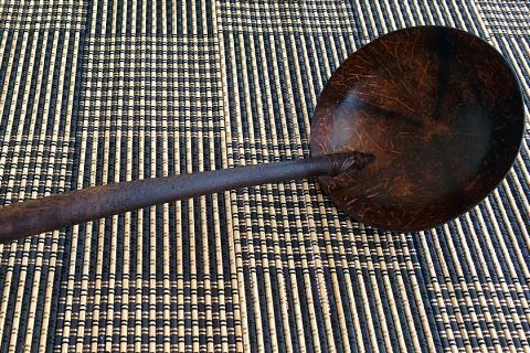 A coconut shell ladle. The Thai for "a coconut shell ladle" is "ทัพพีกะลา". A coconut shell ladle. The Thai for "a coconut shell ladle" is "ทัพพีกะลา".