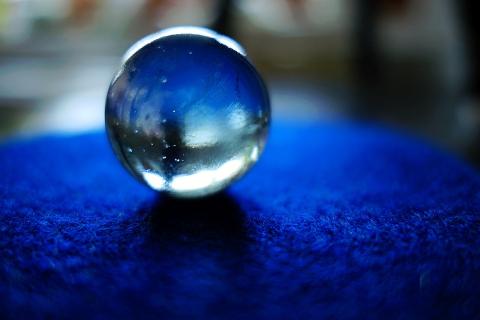 Crystal ball. The Thai for "crystal ball" is "ลูกแก้ว".