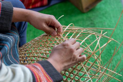 To weave; to interlace. The Thai for "to weave; to interlace" is "สาน".