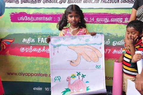 A girl with her drawing. The Thai for "a girl with her drawing" is "เด็กผู้หญิงกับรูปวาดของเธอ". A girl with her drawing. The Thai for "a girl with her drawing" is "เด็กผู้หญิงกับรูปวาดของเธอ".
