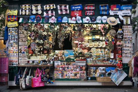 Souvenir shop. The Thai for "souvenir shop" is "ร้านขายของฝาก".