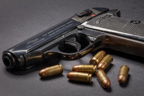 A gun and some bullets. The Thai for "a gun and some bullets" is "ปืนและลูกปืน". A gun and some bullets. The Thai for "a gun and some bullets" is "ปืนและลูกปืน".