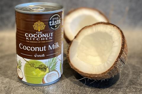 Coconut milk. The Thai for "coconut milk" is "กะทิ".