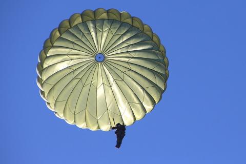 Parachute. The Thai for "parachute" is "ร่มชูชีพ".