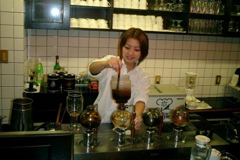 The woman is making coffee. The Thai for "the woman is making coffee" is "ผู้หญิงกำลังชงกาแฟ". The woman is making coffee. The Thai for "the woman is making coffee" is "ผู้หญิงกำลังชงกาแฟ".