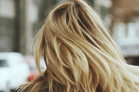 Blond. The Ukrainian for "blond" is "блондинка".