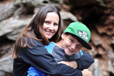 A mother and her son. The Ukrainian for "a mother and her son" is "мати та її син".